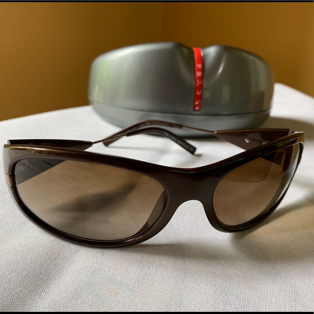 Prada sunglasses with original case.